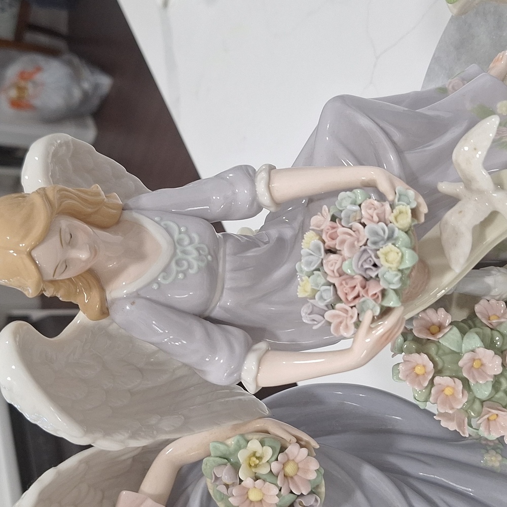 Porcelain Angel Figurine with Floral Basket